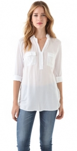 WornOnTV: Jane’s white button front top with two pockets on Happy ...