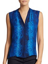 WornOnTV: Jacqueline’s blue snake print blouse and spike necklace on ...